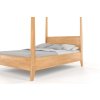 Holzdoppelbett Baldachin aus massiver Buche mit Baldachin, Seitenansicht.